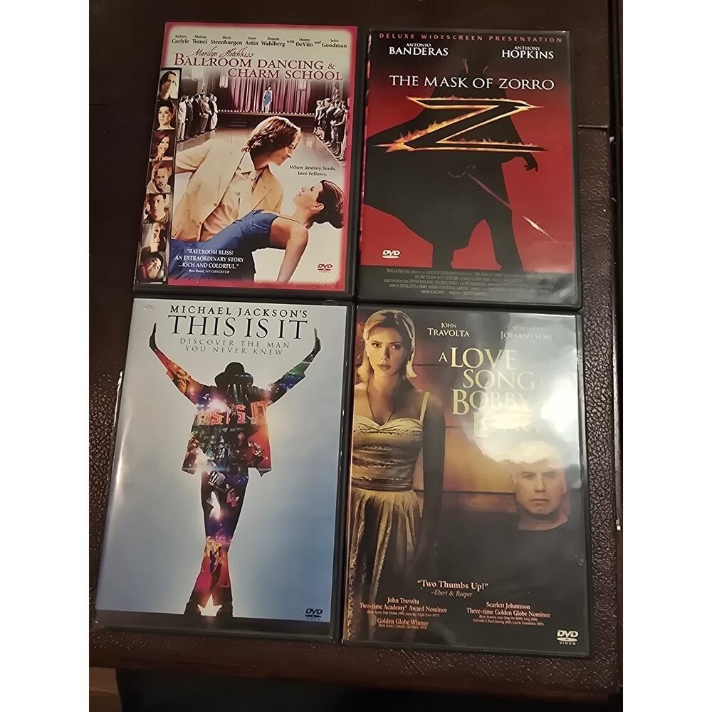 4 DVDS Titles in Description